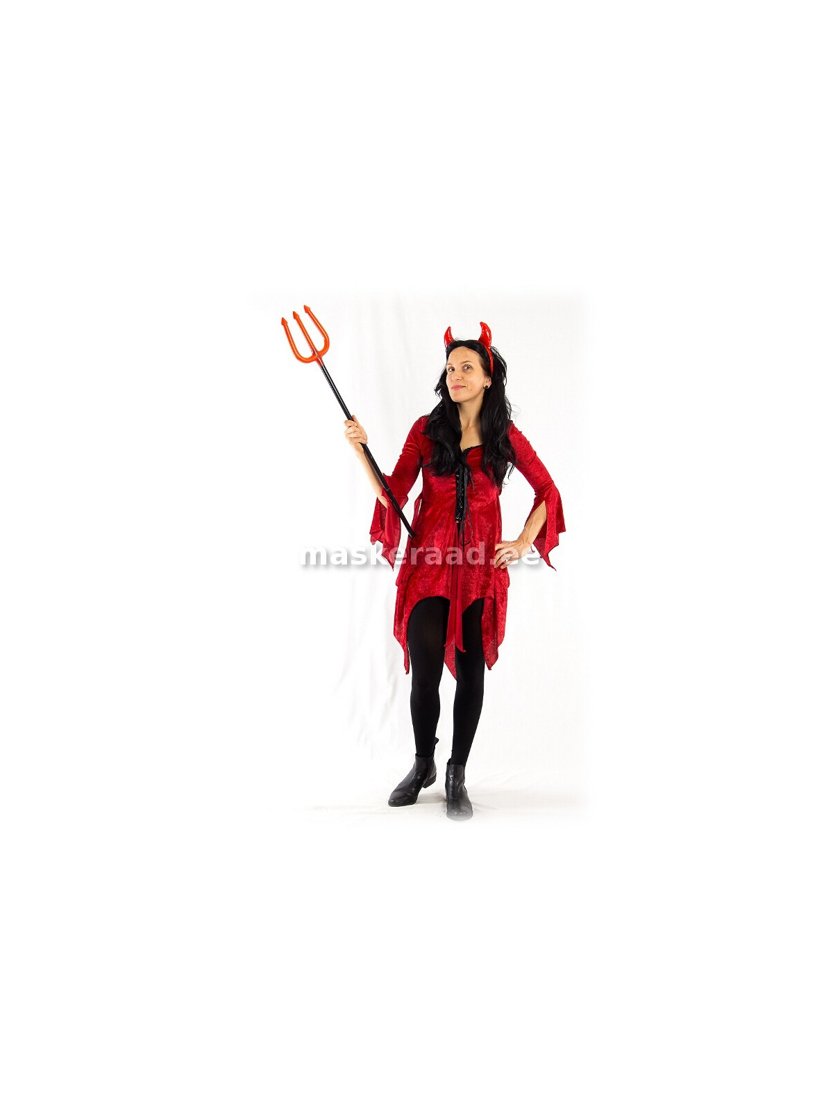 Kuradike tumepunases samettuunikas