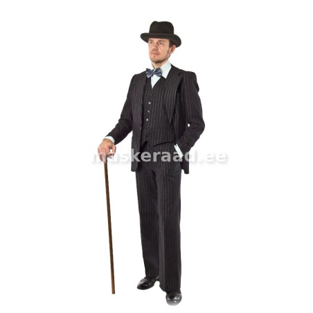 20 - 30 ndate härrasmees mustas laiema triibuga vestiga ülikonnas