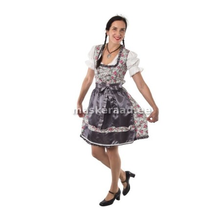 Baieri tüdruk roosilises kleidis halli põllega